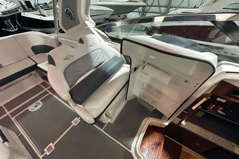 Slide: The Image of 2021 Chaparral 347 SSX boat interior with luxurious seating and modern amenities. - 20