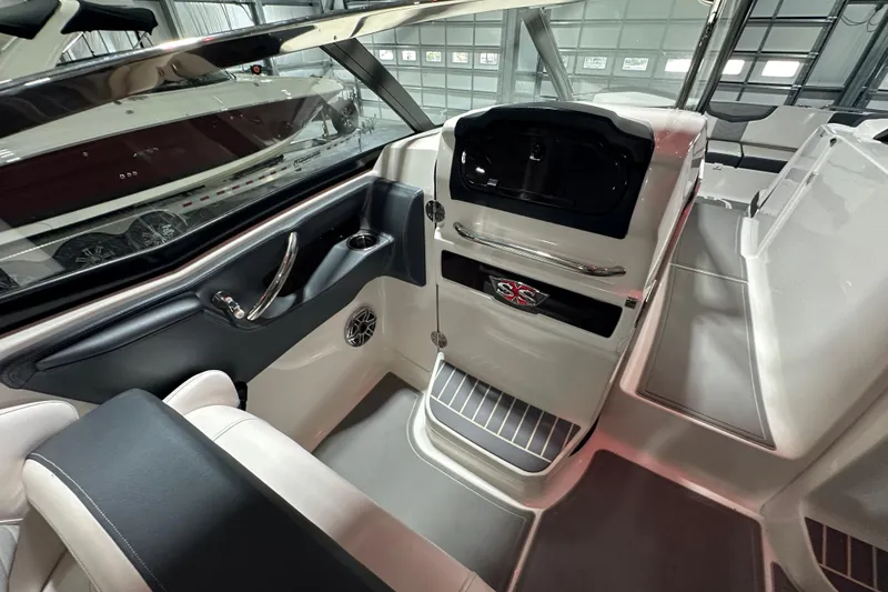 Slide: The Image of Interior of 2021 Chaparral 347 SSX boat, featuring sleek design and modern amenities. - 22