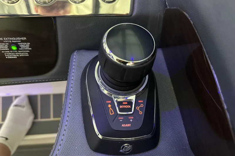 Slide: The Image of 2021 Chaparral 347 SSX boat control panel with joystick and Skyhook feature. - 37