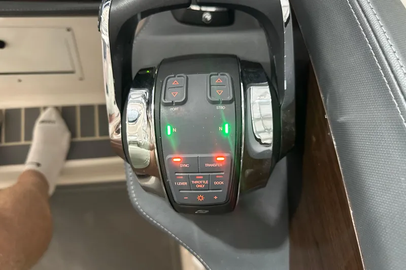 Slide: The Image of Control panel of a 2021 Chaparral 347 SSX boat with illuminated buttons. - 41