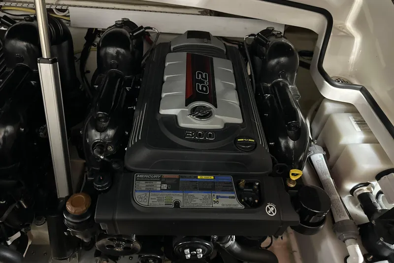 Slide: The Image of 2021 Chaparral 347 SSX engine compartment featuring a Mercury 6.2L engine. - 61