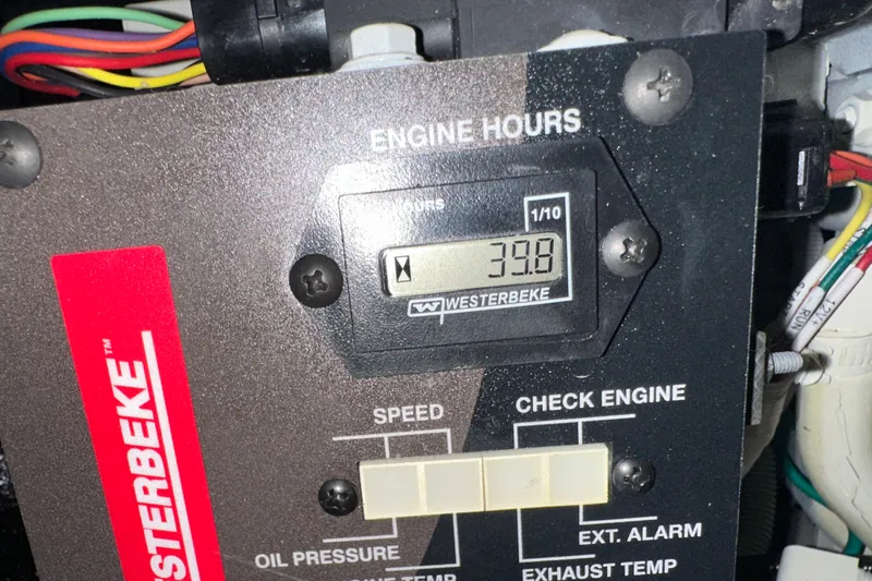 Slide: The Image of Westerbeke engine hour meter showing 39.8 hours on Chaparral 347 SSX, 2021 model. - 64