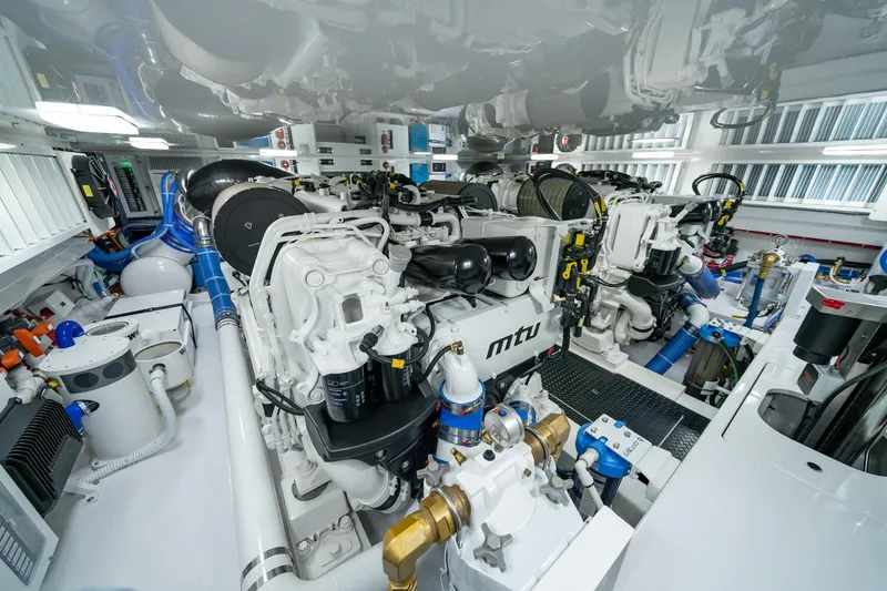 Slide: The Image of Engine room of 2025 Viking 64 Convertible yacht with MTU engines and advanced equipment. - 45