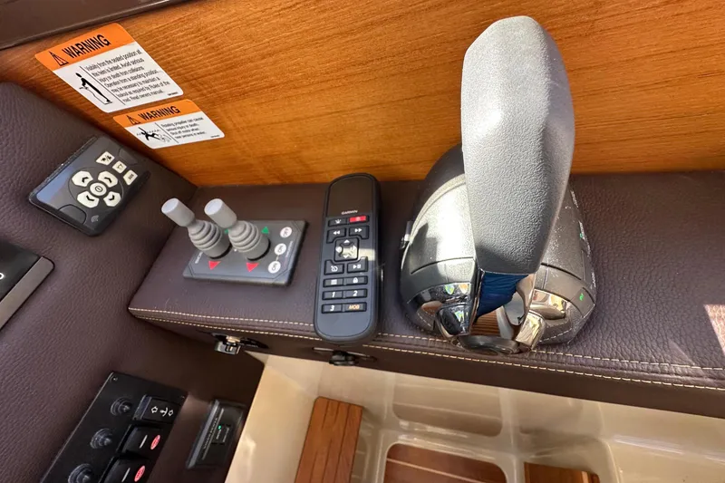 Slide: The Image of Control panel of a 2020 Ranger Tugs R-29 boat with joystick and remote. - 28