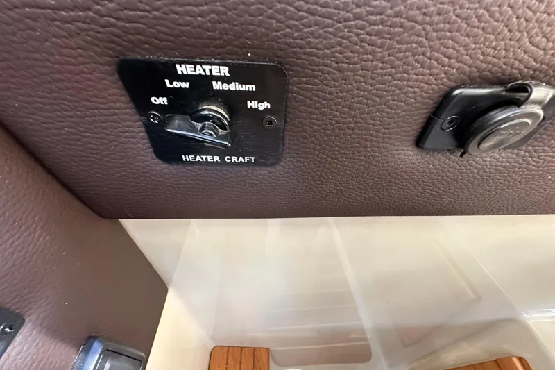 Slide: The Image of Heater control panel on 2020 Ranger Tugs R-29 boat interior. - 29