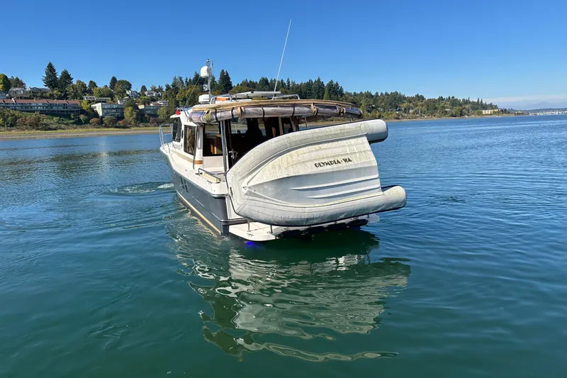 Slide: The Image of 2020 Ranger Tugs R-29 boat on calm water, Olympia, WA. - 3