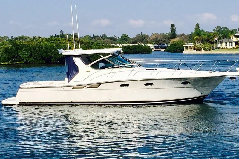 Slide: The Image of 2007 Tiara Yachts 3600 Open cruising on a serene waterway. - 2