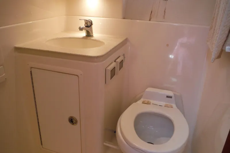 Slide: The Image of 2007 Tiara Yachts 3600 Open bathroom with sink and toilet. - 22