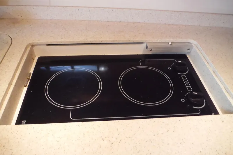 Slide: The Image of Built-in electric stove on 2007 Tiara Yachts 3600 Open, featuring two burners. - 28