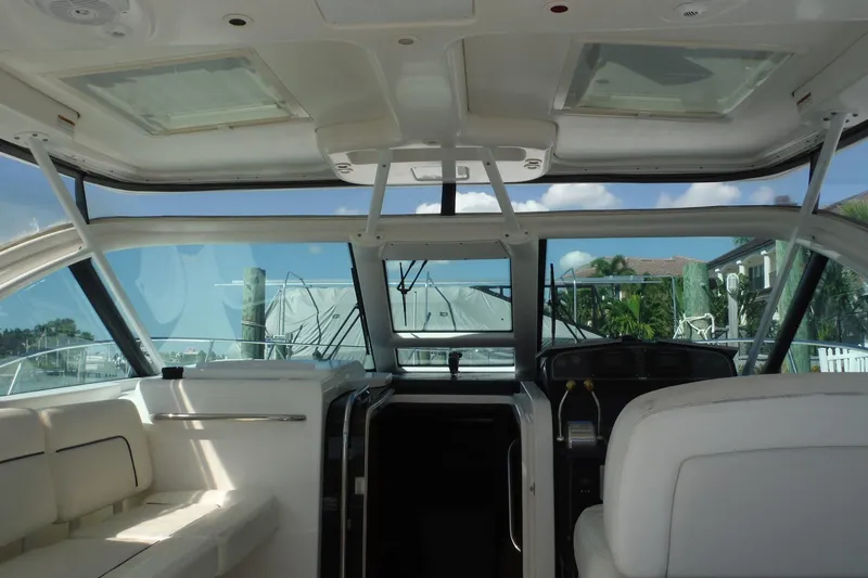 Slide: The Image of 2007 Tiara Yachts 3600 Open interior with helm and seating, showcasing luxury design. - 40