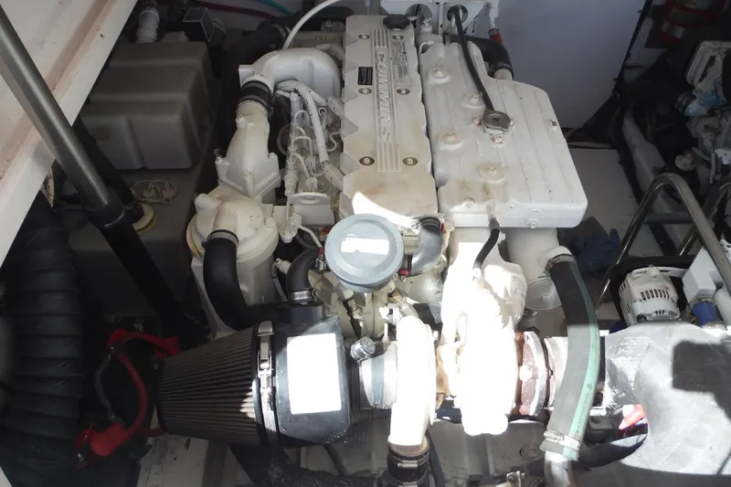 Slide: The Image of Engine compartment of a 2007 Tiara Yachts 3600 Open, featuring a Cummins engine. - 42