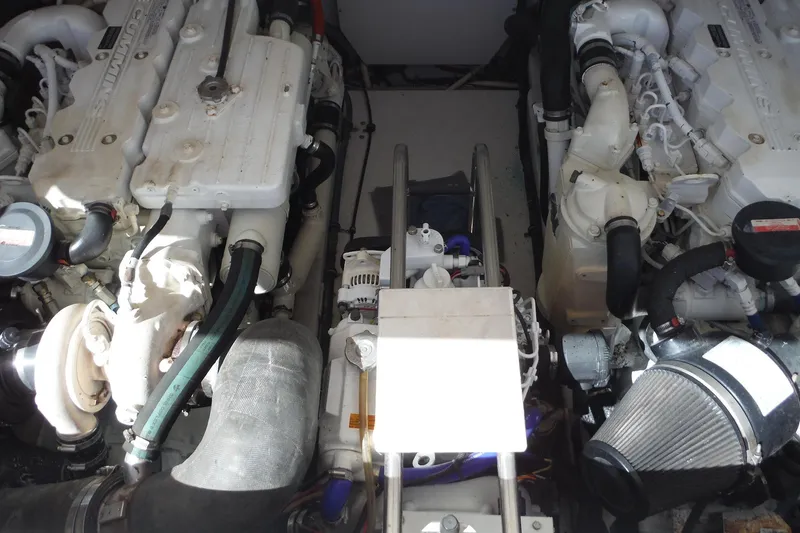 Slide: The Image of Engine compartment of a 2007 Tiara Yachts 3600 Open, showcasing dual engines and components. - 44