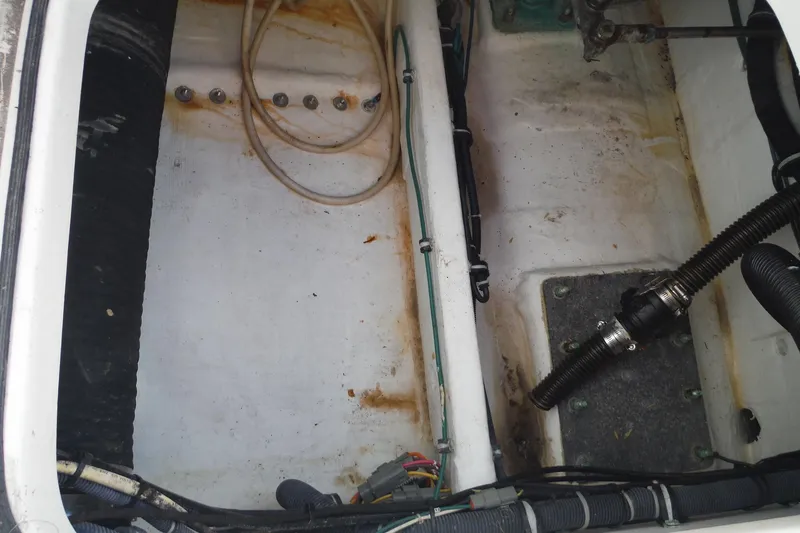 Slide: The Image of Bilge area of 2007 Tiara Yachts 3600 Open, showing hoses and fittings. - 53