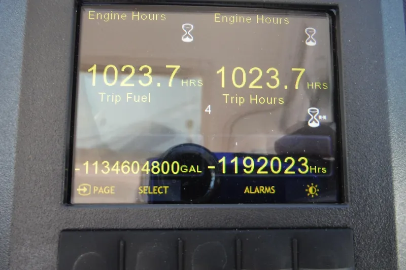 Slide: The Image of Display screen showing engine hours and trip data on a 2007 Tiara Yachts 3600 Open. - 58