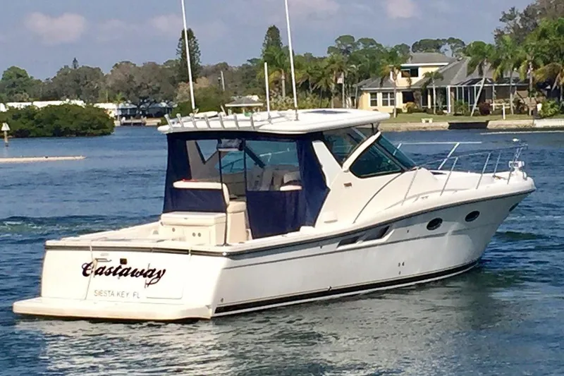 Slide: The Image of 2007 Tiara Yachts 3600 Open cruising on a scenic waterway. - 62