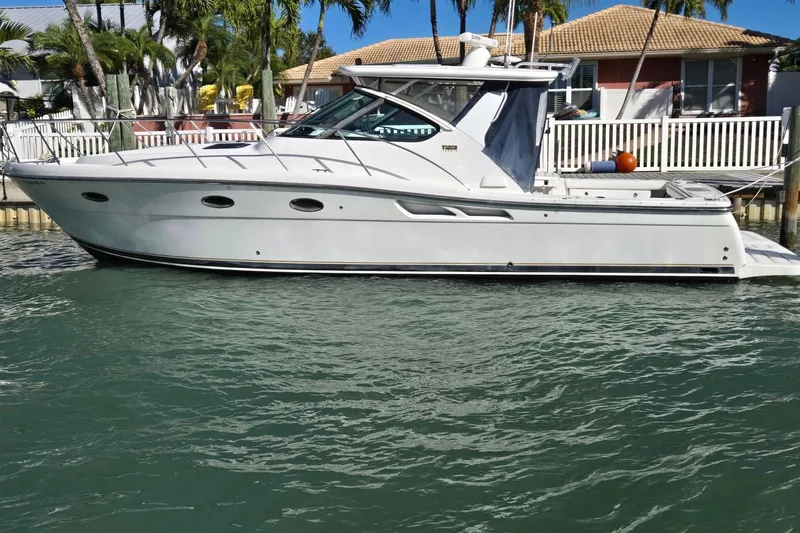 Slide: The Image of 2007 Tiara Yachts 3600 Open boat docked in sunny waterfront setting. - 64