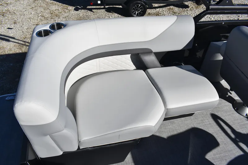 Slide: The Image of Luxurious seating on 2026 Lowe SS 230 WV boat with cup holders and modern design. - 21