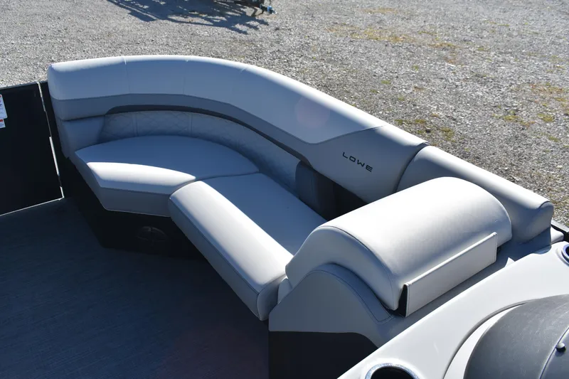 Slide: The Image of 2026 Lowe SS 230 WV boat interior with sleek, modern seating design. - 9