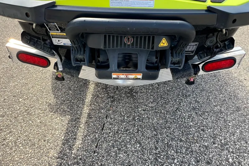 Slide: The Image of Rear view of a 2018 Sea-Doo RXP-X 300 on a trailer, showing exhaust and taillights. - 8