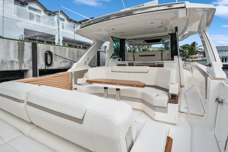 Slide: The Image of 2022 Tiara Yachts 48 LS luxury yacht with elegant seating and modern design. - 19