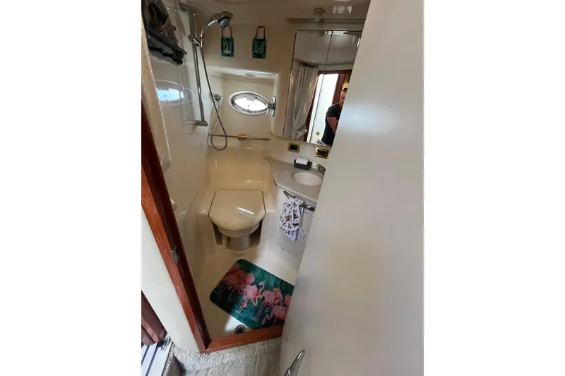 Slide: The Image of Bathroom interior of 2000 Sea Ray 460 Sundancer yacht with shower and toilet. - 14