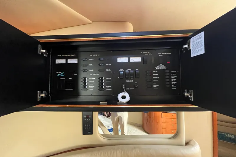 Slide: The Image of Electrical control panel inside a 2000 Sea Ray 460 Sundancer yacht. - 18