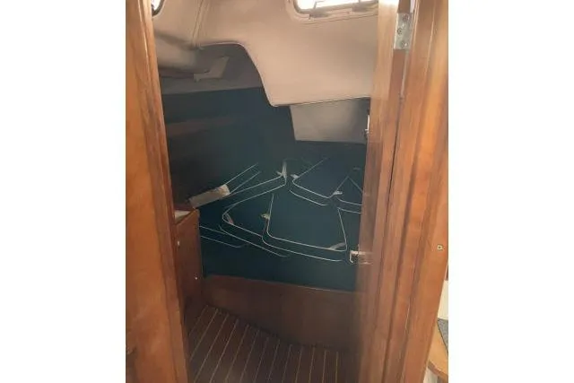 Slide: The Image of Interior cabin view of 2004 J Boats J/133 sailboat with wooden finish. - 15