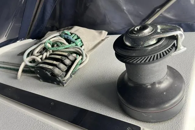 Slide: The Image of Deck of 2004 J Boats J/133 with winch and coiled ropes. - 28