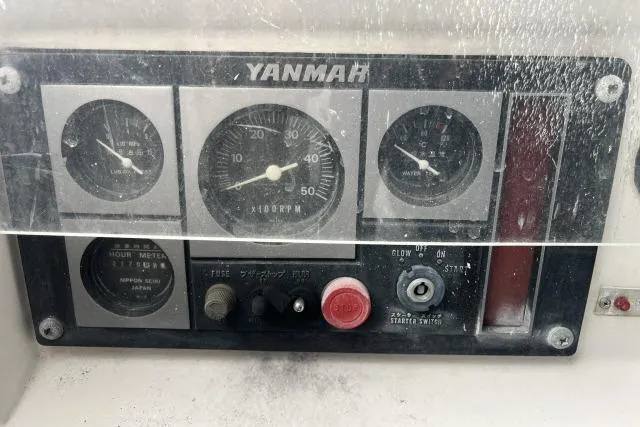 Slide: The Image of Control panel of a 2004 J Boats J/133 with Yanmar engine gauges. - 42