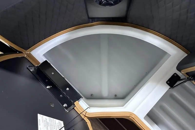 Slide: The Image of Interior storage compartment of 2026 Premier 230 Sunsation RL boat, featuring sleek design and durable materials. - 11