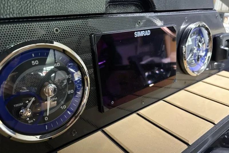 Slide: The Image of Dashboard of 2026 Premier 230 Sunsation RL with Simrad display and gauges. - 20