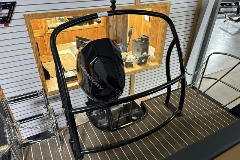 Slide: The Image of 2026 Premier 230 Sunsation RL boat with Mercury engine, showroom display. - 29