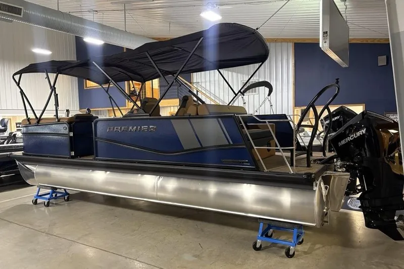 Slide: The Image of 2026 Premier 230 Sunsation RL pontoon boat with Mercury engine in showroom. - 5