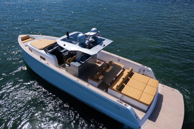 Slide: The Image of 2023 Pardo Yachts 43 luxury yacht cruising on open water, featuring spacious deck seating. - 11