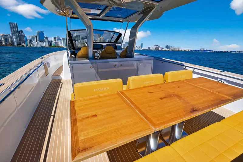 Slide: The Image of Luxury Pardo Yachts 43, 2023 model, with elegant deck and city skyline view. - 18