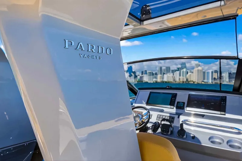 Slide: The Image of Interior view of 2023 Pardo Yachts 43, showcasing helm and city skyline. - 30