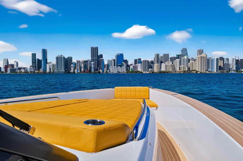Slide: The Image of 2023 Pardo Yachts 43 cruising with city skyline in the background. - 35