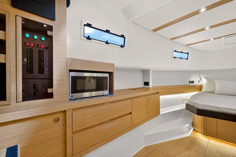 Slide: The Image of Luxurious interior of 2023 Pardo Yachts 43 with modern amenities and elegant wood finish. - 47