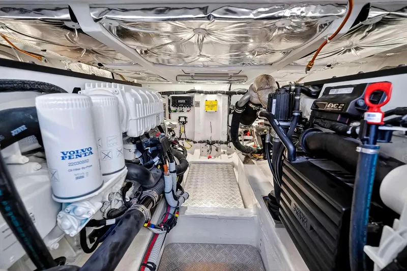 Slide: The Image of Engine room of 2023 Pardo Yachts 43, featuring Volvo Penta components and advanced machinery. - 56