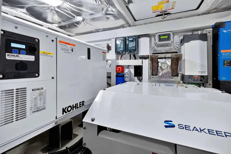 Slide: The Image of Engine room of 2023 Pardo Yachts 43 featuring Kohler and Seakeeper equipment. - 63