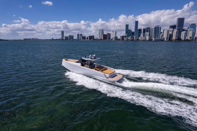 The Image of 2023 Pardo Yachts 43 cruising near city skyline on a sunny day. - 0