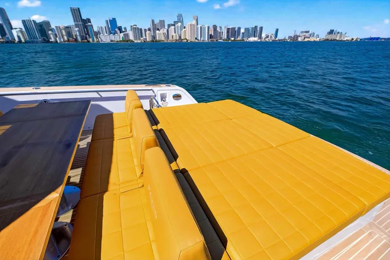 Slide: The Image of Luxury Pardo Yachts 43, 2023 model, with city skyline and ocean view. - 16