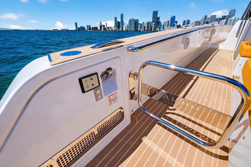 Slide: The Image of 2023 Pardo Yachts 43 deck with city skyline in background. - 34