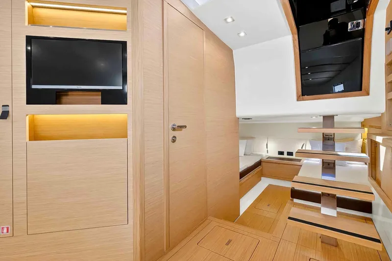Slide: The Image of Luxurious interior of 2023 Pardo Yachts 43, featuring modern wood finishes and a sleek design. - 41