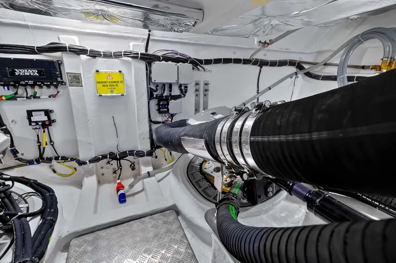 Slide: The Image of Engine room of 2023 Pardo Yachts 43, featuring Volvo Penta components and wiring. - 58