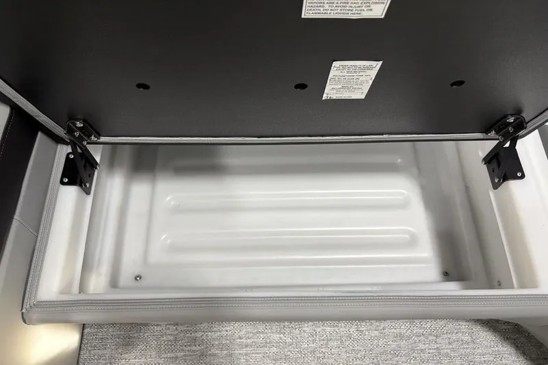 Slide: The Image of Open storage compartment in 2026 Premier 230 Solaris RF boat, showcasing interior space. - 10