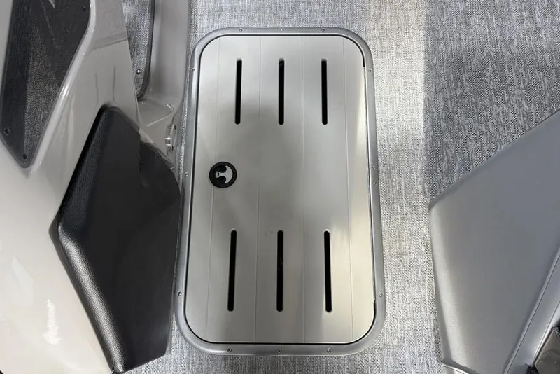 Slide: The Image of 2026 Premier 230 Solaris RF boat floor with sleek storage compartment. - 11