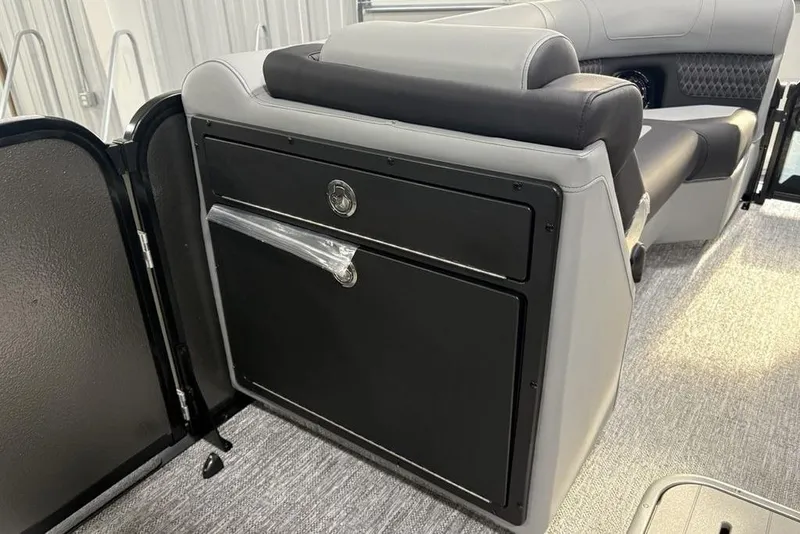 Slide: The Image of 2026 Premier 230 Solaris RF interior seating with sleek black and gray design. - 15