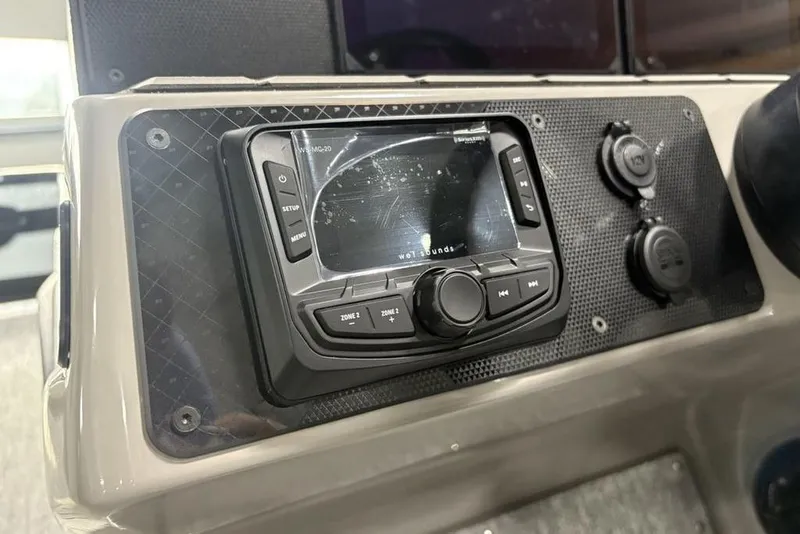 Slide: The Image of Dashboard of 2026 Premier 230 Solaris RF with audio control panel. - 22