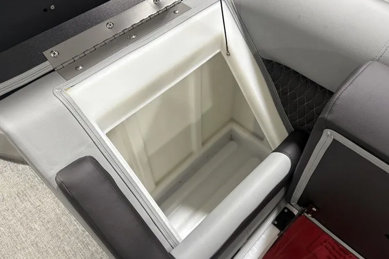 Slide: The Image of Open storage compartment in 2026 Premier 230 Solaris RF boat, featuring sleek upholstery design. - 31